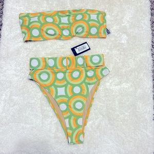 Retro inspired high cut, belted, and high waisted bikini 👙